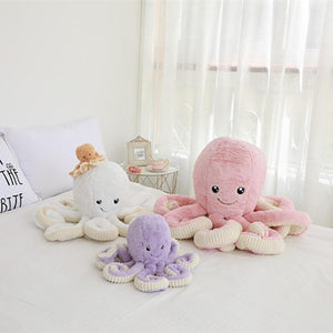 Three plushie octopus