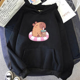 Capybara Floating & Sipping Bubble Tea Unisex Hoodie-Kawaii Dream