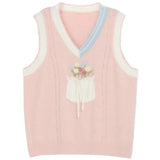 kawaii pink knit sweater vest floral bouquet bow pocket pastel blue cream trim product flat lay
