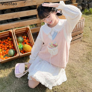 kawaii pink sweater vest floral embroidery sweet lolita layered outfit side sitting view