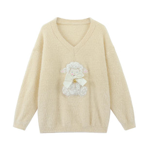kawaii cream fluffy knit sweater lamb bow appliqué flat lay product shot