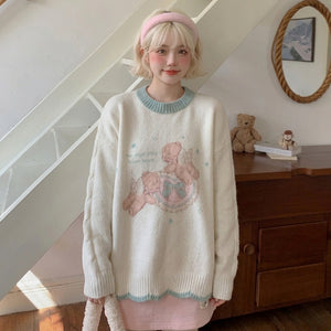 kawaii oversized cream knit sweater angel bear graphic mint trim full length side view model