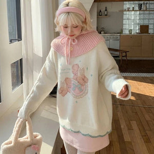 kawaii white knit pullover angel bear pastel graphic harajuku outfit styled with pink scarf