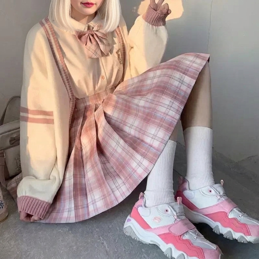 kawaii knit cardigan pink harajuku seated outfit plaid skirt side view