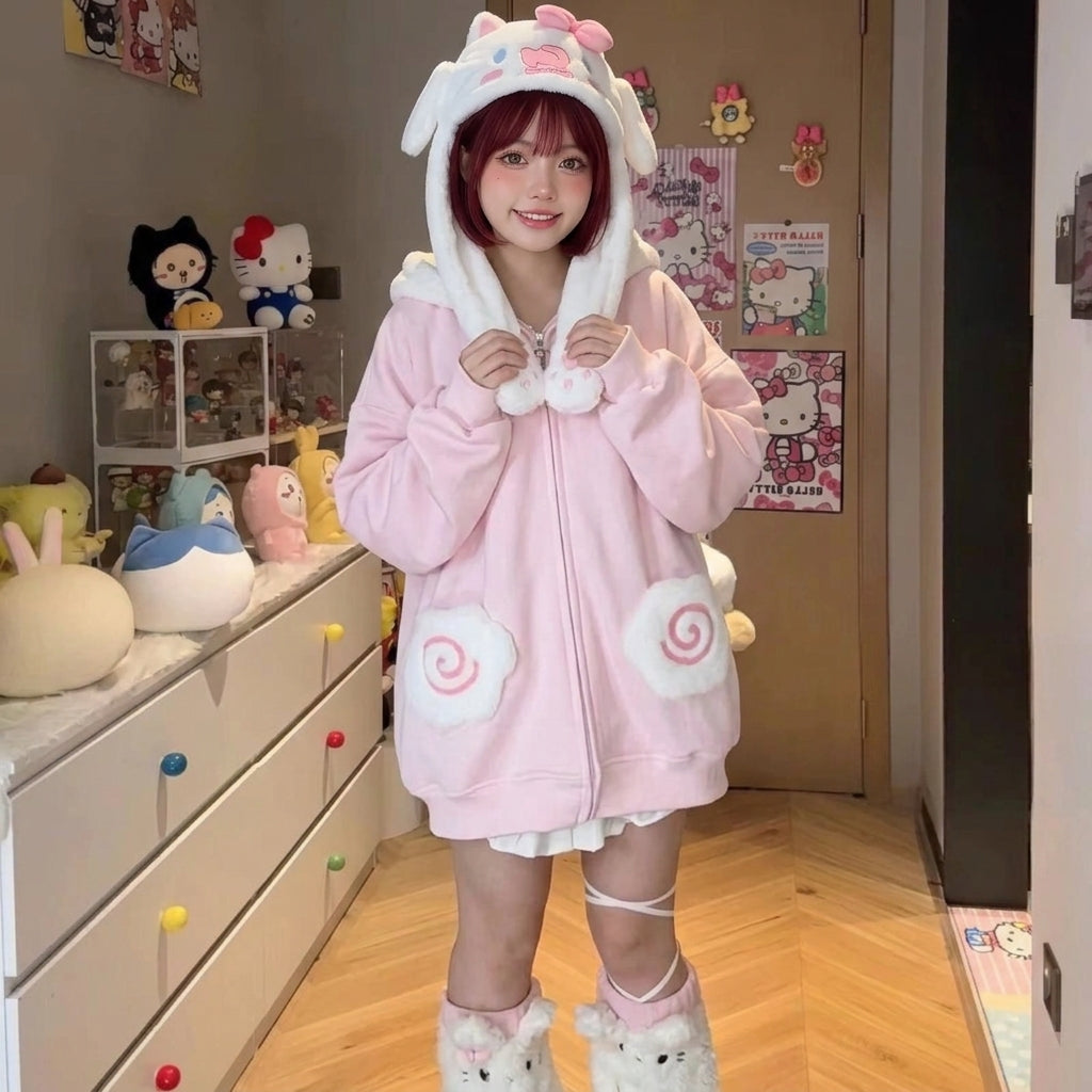 kawaii pink zip hoodie fluffy pom-pom drawstrings swirl pockets harajuku cutecore model holding poms